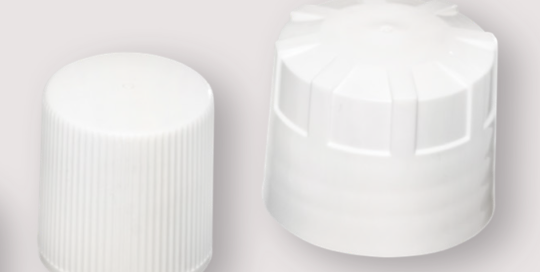 Two white plastic continuous thread caps, one ribbed and one with a child-resistant push-down-and-turn design.