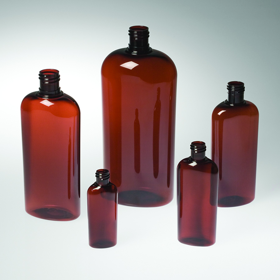 five amber oval bottles with rounded shoulders, in five sizes