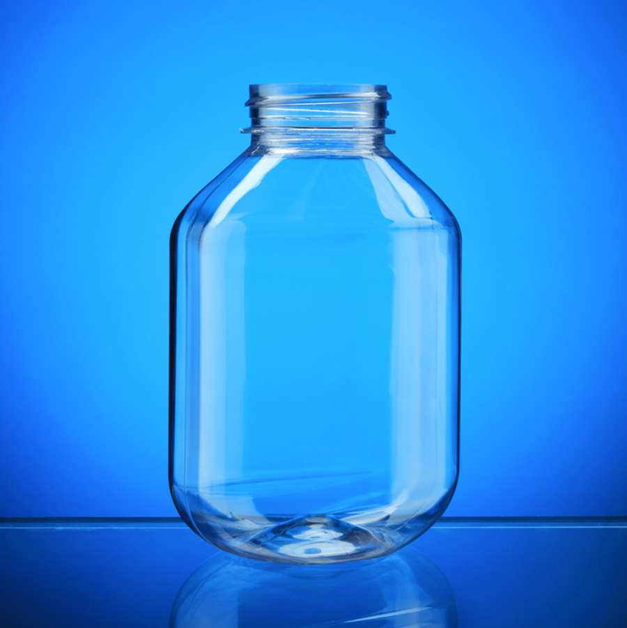 clear plastic bottle with rounded shoulder, base and shape and a wider opening