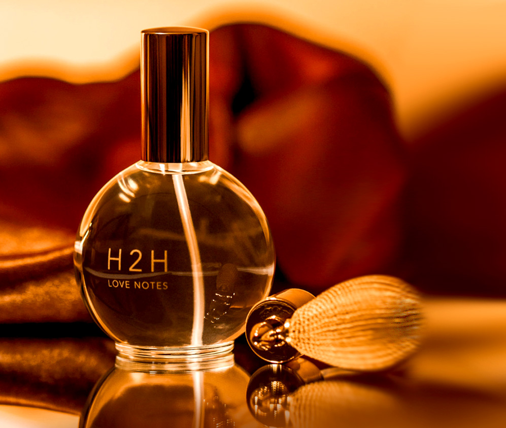 Bespoke round glass perfume bottle Bespoke round glass perfume bottle with squeeze bulb atomizer, packaged in a custom-designed gift box